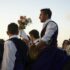 The groom, dressed traditionally, on his way to the church